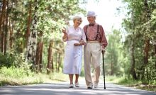 elderly couple walking